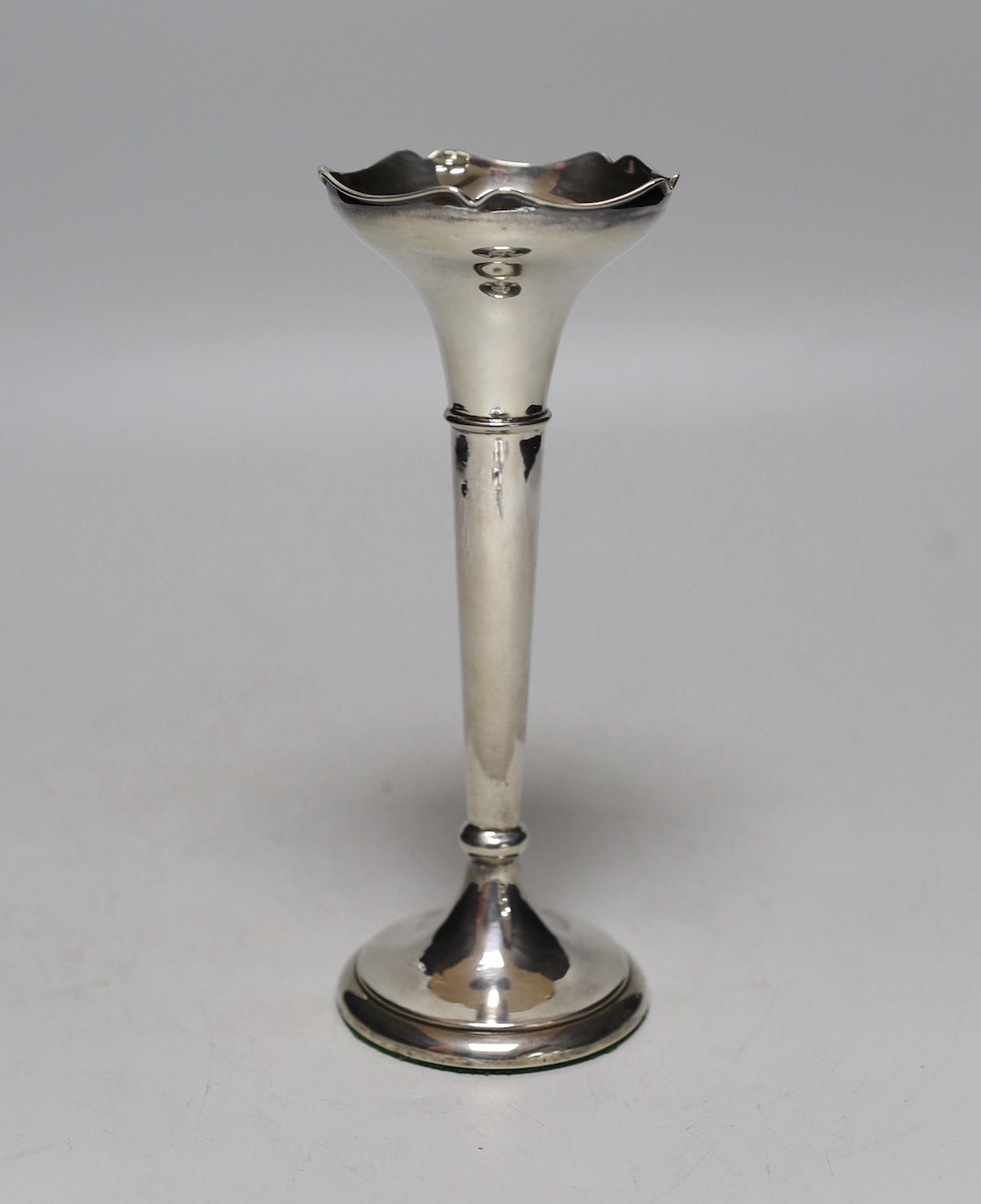 A pair of George V silver mounted cut glass preserve jars, George Unite & Sons, Birmingham, 1915, height 90mm, together with a pair of George IV silver condiment spoons, London, 1823, a silver mounted posy vase and a set